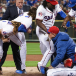 Vladimir Guerrero Jr. Injury: Blue Jays Star Kneed in the Head During Chaotic Play — AI-generated editorial illustration