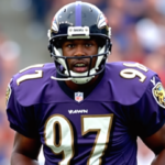 O.J. Brigance, Ravens' First Super Bowl Team Member, Dies at 56 After ALS Battle — AI-generated editorial illustration